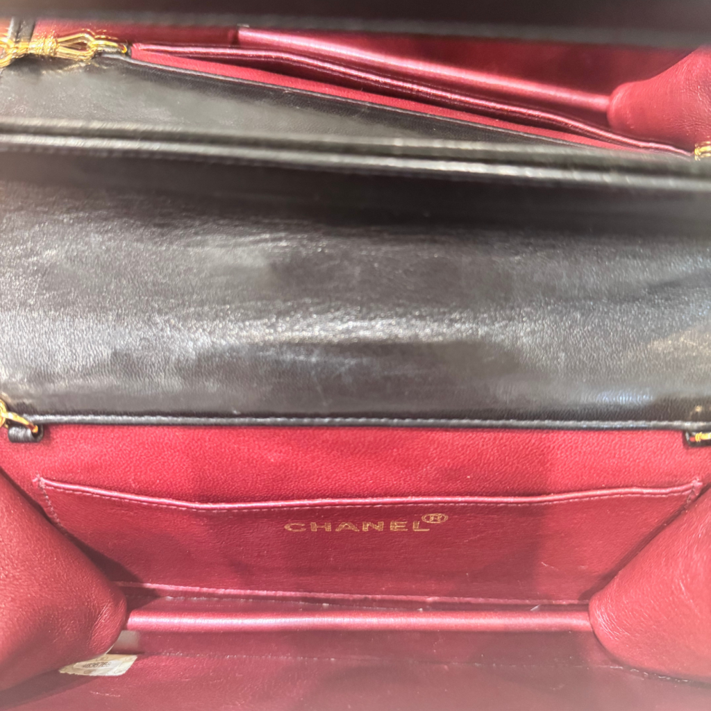Chanel Black Quilted Leather Grommet WOC (1996-1997)