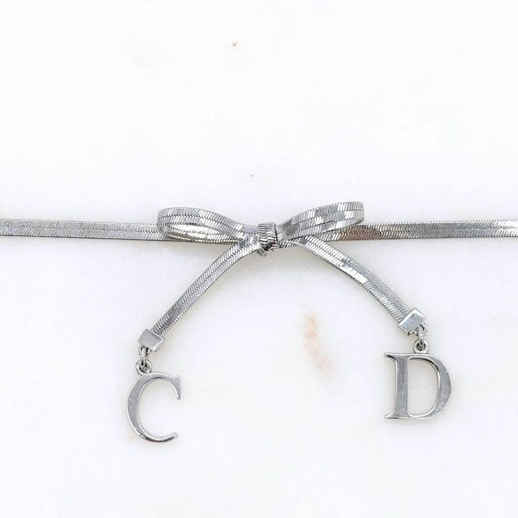 Christian Dior Silver Bow CD Necklace