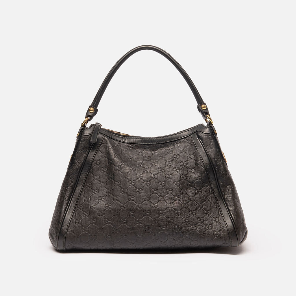 Gucci Black Leather Empreinte Hobo