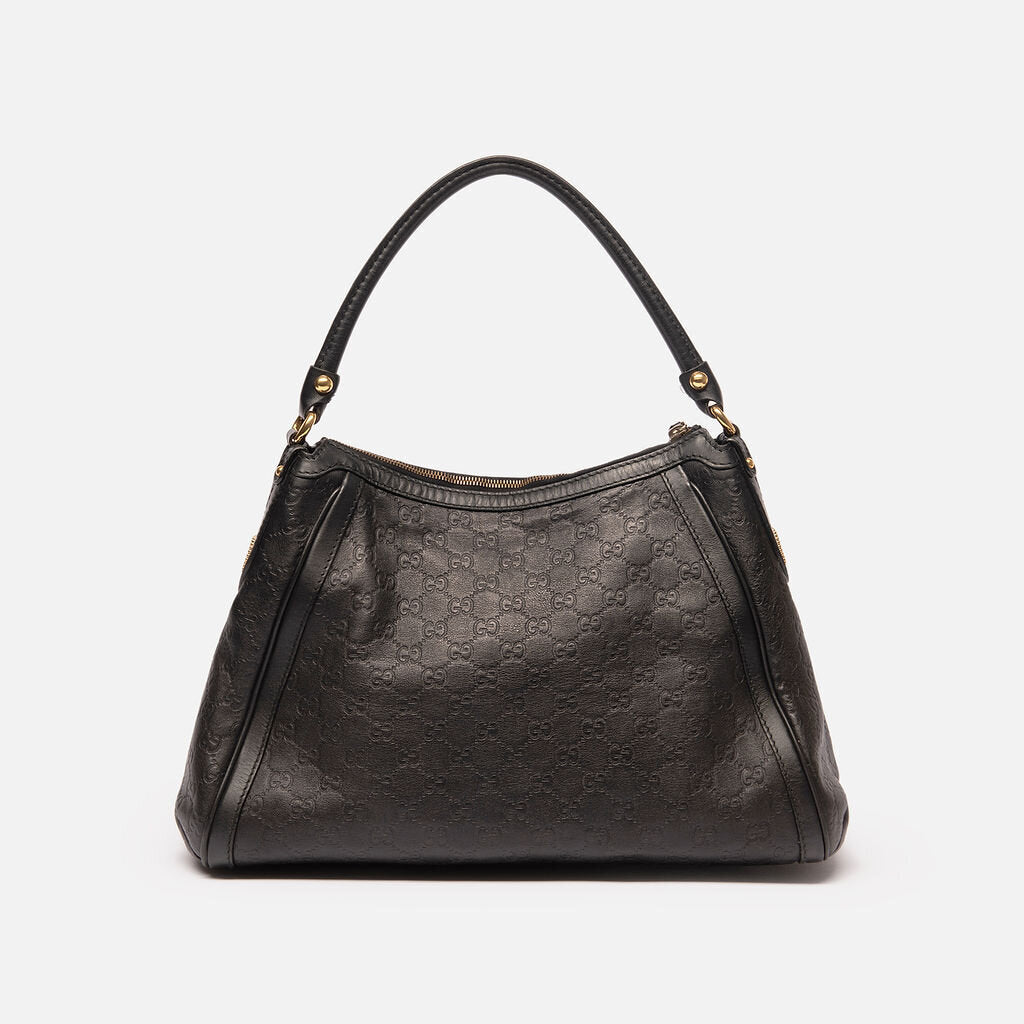 Gucci Black Leather Empreinte Hobo