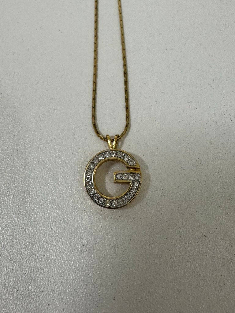Gold Tone Crystal G Necklace
