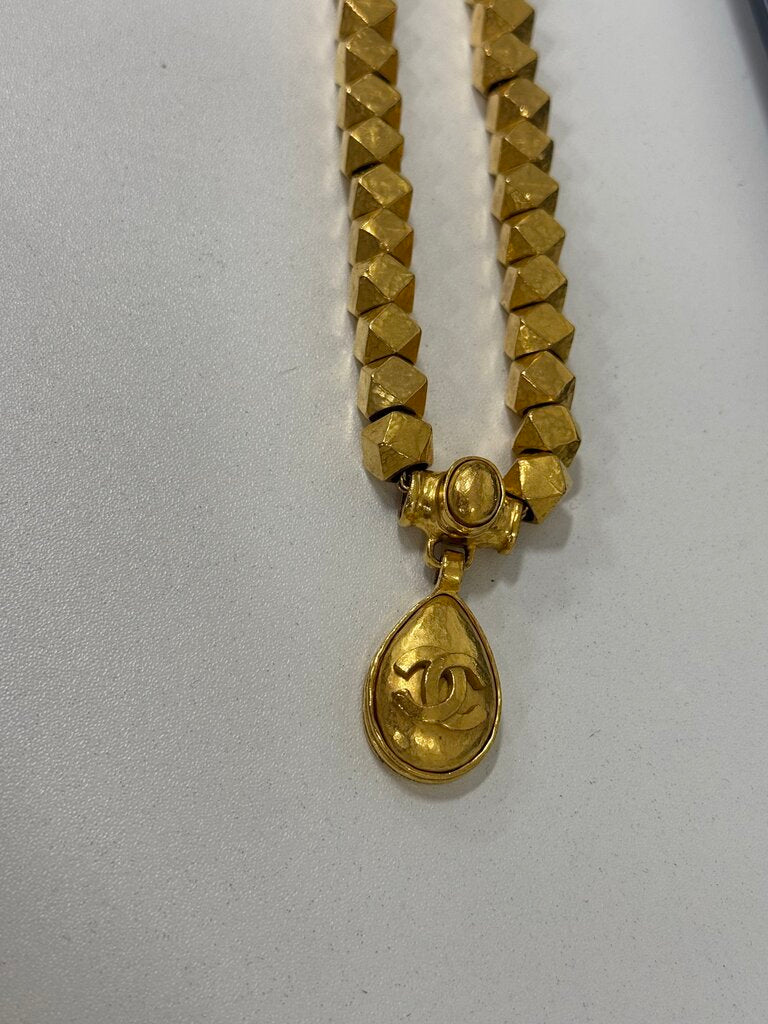 97A Gold Tone Geometric CC Pendant Necklace