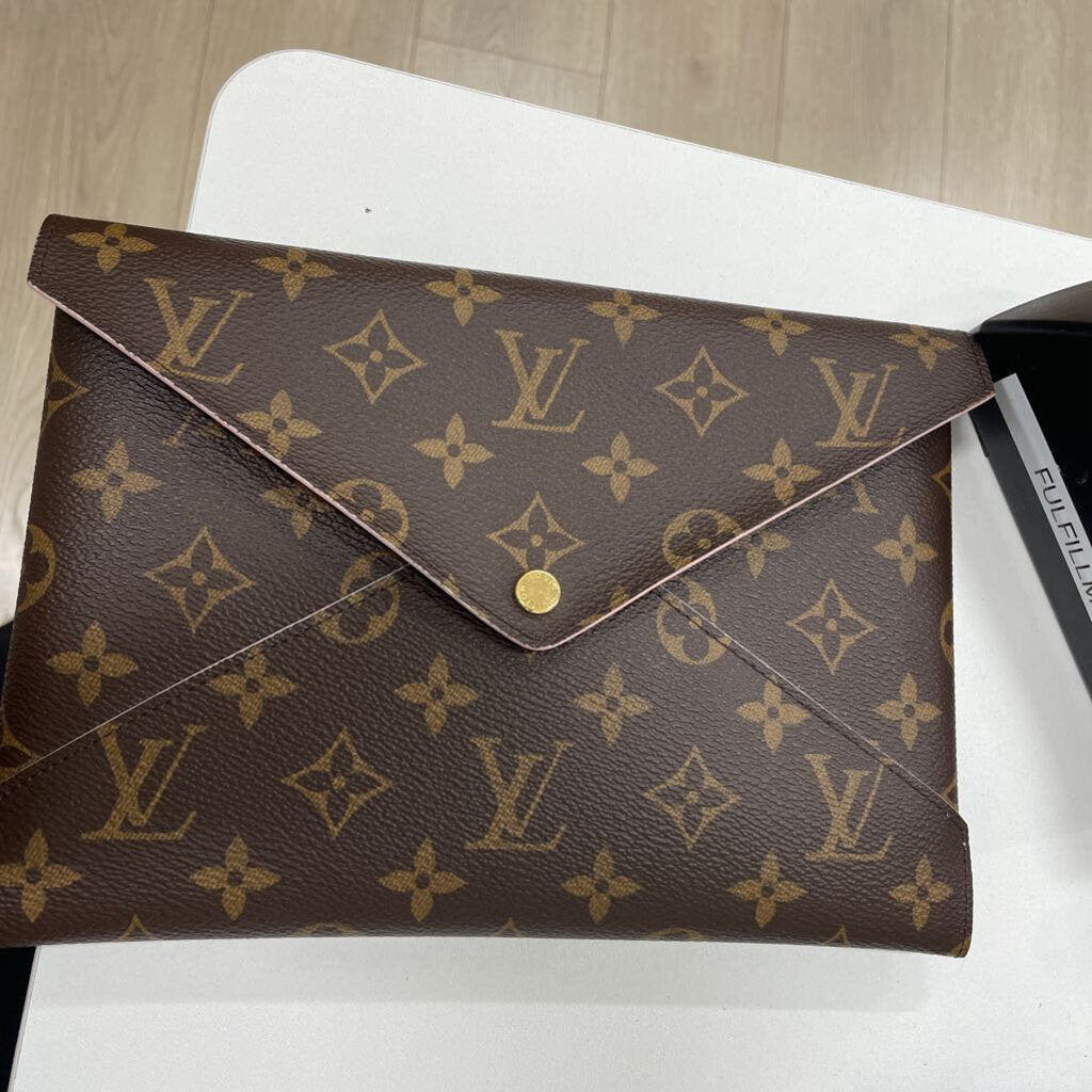Monogram Kirigami Pochette (est 850)